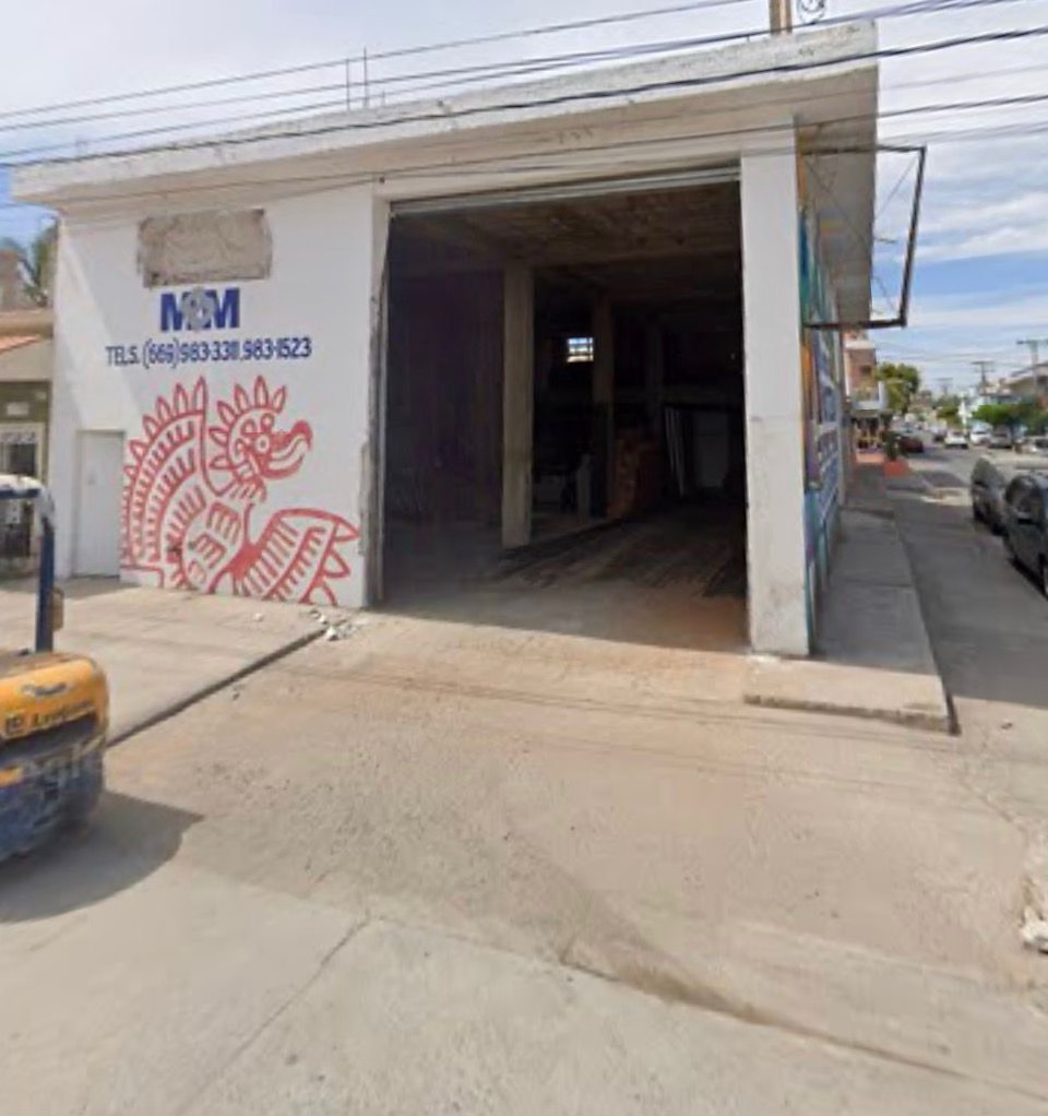 Bodega de Materiales Benítez con material de obra estibado